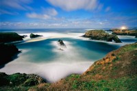 Moonlit Cove and Lighthouse